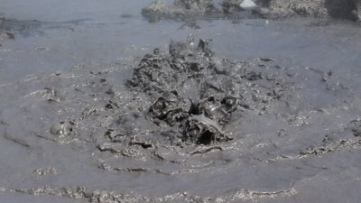 Watch mud volcano erupt beneath a crown of flames in Taiwan