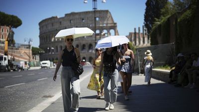 Floods and heatwave in Italy lead to two deaths amid extreme weather