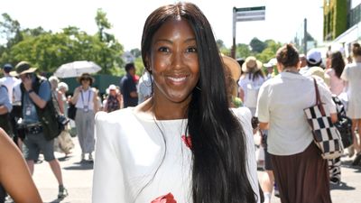 Angellica Bell flies the flag for fabulous London style at Wimbledon in poppy print dress and post box clutch
