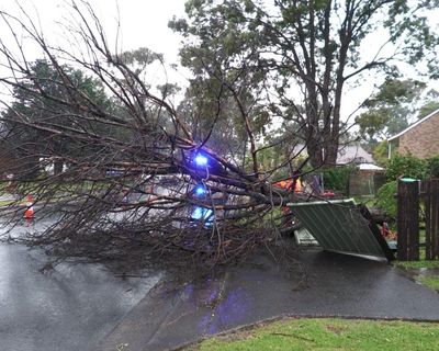 NSW weather: storm brings 13-metre high waves and wild winds as BoM warns of ‘second surge’