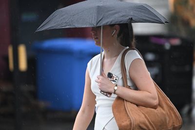 London weather: It's raining! Commuters rejoice as cooler, damp morning follows swelteringly hot night