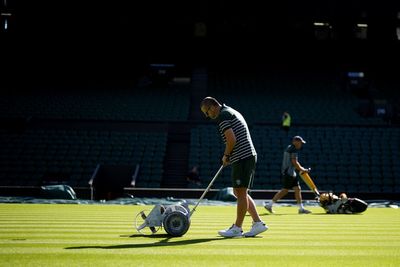 Wimbledon groundsman says Centre Court holding firm amid record heat