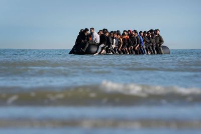 Channel crossings by migrants pass 20,000 in record time