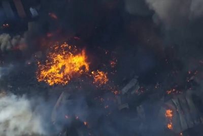 Aerial footage shows scene of devastation after huge explosion at fireworks warehouse