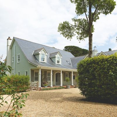 The artist owner transformed this once rundown clapboard house into a stunning seaside home