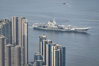 Chinese aircraft carrier sails into Hong Kong to boost patriotism