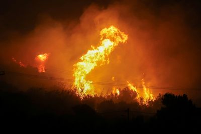 Video shows Crete wildfire raging as firefighters desperately try to contain blaze