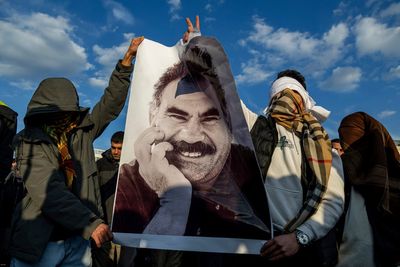 Kurdish fighters in northern Iraq to hand over weapons in first step toward disarmament
