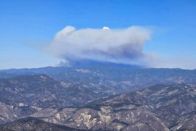 California blaze spreads in hot, windy conditions in year’s largest wildfire