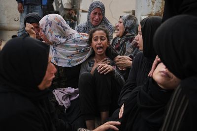Airstrikes and shootings kill 94 Palestinians in Gaza including dozens trying to get aid, officials say