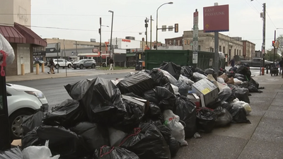 WATCH: Piles of Trash Bags, Overflowing Dumpsters Lining Philadelphia Roads Stun Locals as Sanitation Workers Strike