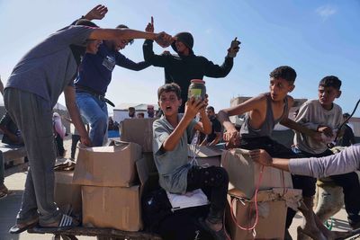 Organization denies AP report that US contractors at its Gaza food distribution sites used live ammo