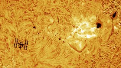 Astrophotographer snaps 'once-in-a-lifetime' shot of solar flare photobombing the ISS