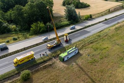 More than 20 are injured including 1 seriously when bus flips over in northeastern Germany