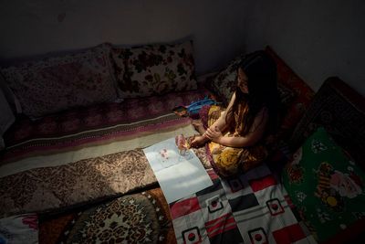 PHOTO ESSAY: Iranians struggled with quiet moments of fear and anxiety for 12 days of war