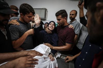 ‘No other explanation’: children of Gaza doctor killed in airstrike believe he was deliberately targeted