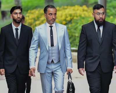 Brothers assaulted police as they resisted airport arrest, UK court hears