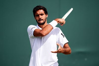 Portuguese tennis player Francisco Cabral sports black ribbon at Wimbledon in tribute to Diogo Jota