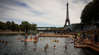 Parisians take a historic plunge into the River Seine after more than a century