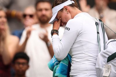 Defending Wimbledon champion Barbora Krejcikova left in tears after defeat to Emma Navarro