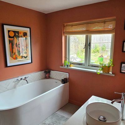 I took a risk and painted my bathroom dark red – a year on, this is everything I wish I'd done differently