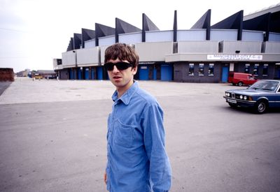 “When I arrived, only Noel was there. I asked about the others and he said, ‘They’re back in England’. They’d had a fight with Chelsea fans on the ferry” How football fans almost derailed an early Oasis photoshoot