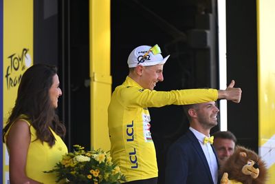 Who is leading the 2025 Tour de France after stage 12?