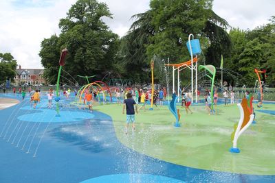 Man, 34, is charged with attempted kidnap of children at popular park splash pad