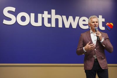 Southwest's CEO says he picks up trash and serves snacks when flying and shares advice from the airline's legendary cofounder