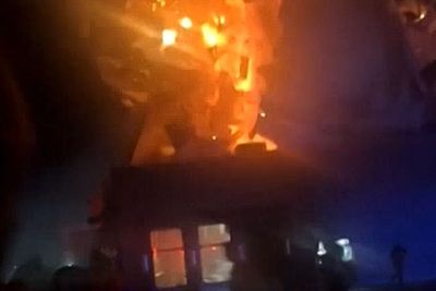 Explosion tears roof off Domino’s Pizza after car crashes into restaurant