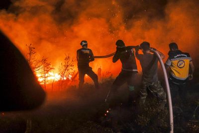 Syrian wildfires spread due to heavy winds and war remnants