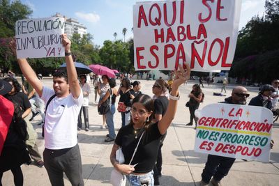 Mexico's president calls march against mass tourism 'xenophobic.' Critics blame government failures