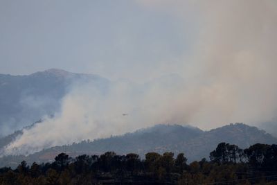 Catalonia wildfire burns 7,000 acres and forces 18,000 people into lockdown
