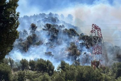 Wildfire near Marseille suspends flights, prompts stay-at-home orders