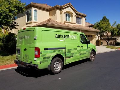 Amazon reportedly asked corporate workers to 'volunteer' to boost warehouse morale by handing out snacks and packing grocery deliveries for Prime Day