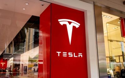 Here's How Much $1,000 Invested In Tesla Stock Today Will Be Worth If Cathie Wood's Price Prediction Comes True In 2029