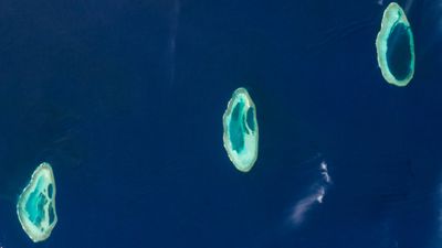 Perfect trio of prehistoric atolls shine like tropical gems off Australian coast — Earth from space