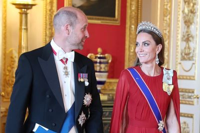Princess of Wales dazzles in dark red silk at star-studded Macron state banquet return