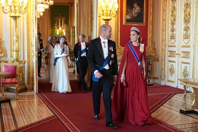Kate is star of the show in dark red silk for dazzling state banquet return