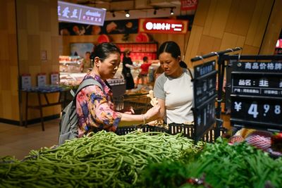 China's Snaps 4-month Consumer Decline But Factory Price Deflation Deepens