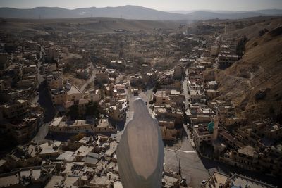 A church bombing leads Syria's Christians to consider leaving as foreign fighters remain