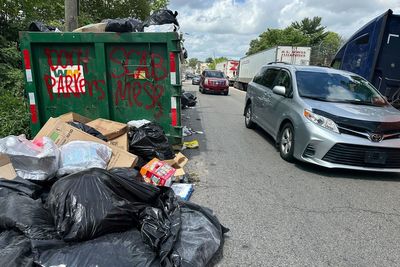 Philadelphia workers and city reach a deal to end strike that halted residential trash pickup
