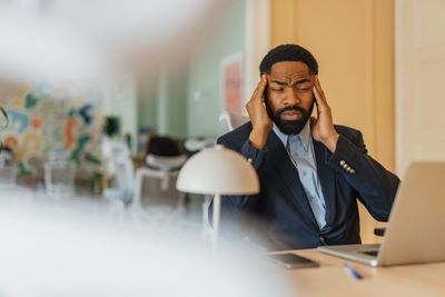 AI is turbocharging worker productivity but it's also wreaking havoc on their mental health