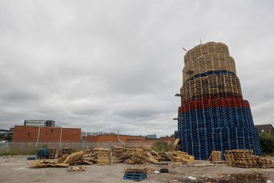 Contractor ‘on standby’ to remove controversial Belfast bonfire