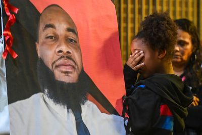 Alabama attorney general pushes for trial of an ex-officer accused of fatally shooting an armed man