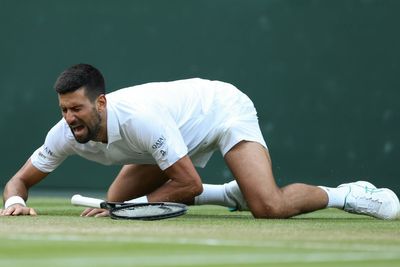 Novak Djokovic survives late fall to seal spot in Wimbledon semi-finals