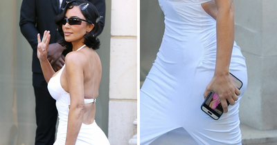 Kim Kardashian Caught Googling Herself While Wearing Controversial Brand At Paris Fashion Week