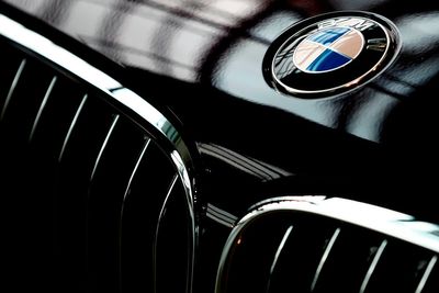 BMW worker was fired after bosses authorised secret filming over back pain