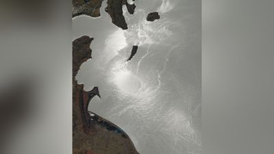 ISS astronaut spies sunglint from Lake Titicaca | Space photo of the day for July 9, 2025