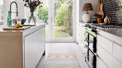 No, I haven't lost the plot – a quick-drying bath mat is my secret alternative to a cleaner, more stylish kitchen floor